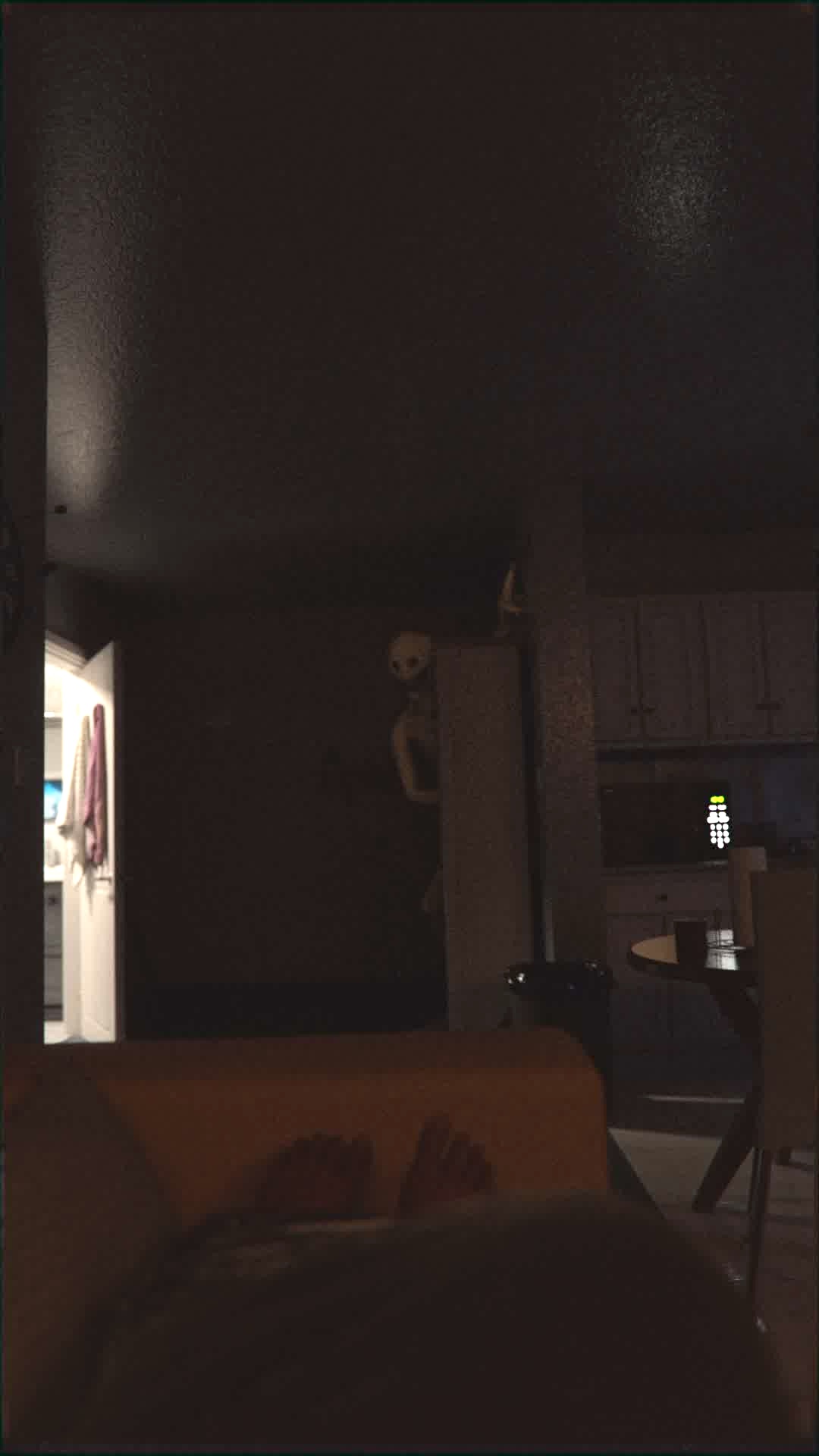 a figure watching from the dark